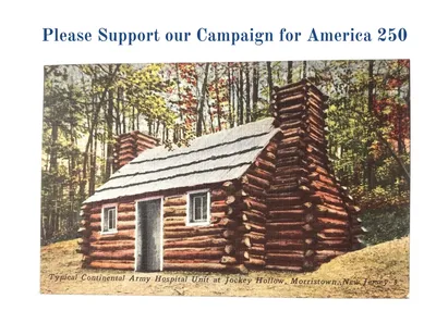 rs=w_400,cg_true A picture of the log cabin that is being used as a shelter for people.